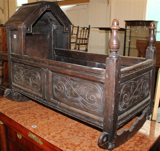 19th Century carved oak rocking cradle
